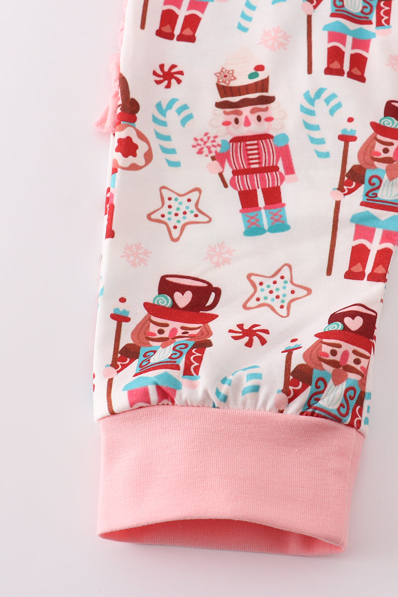 Pink christmas nutcracker print ruffle romper