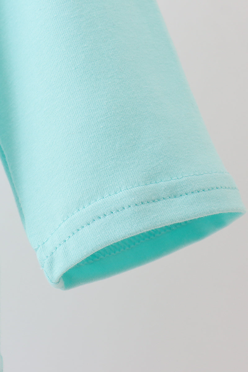 Blue gingerbread applique top